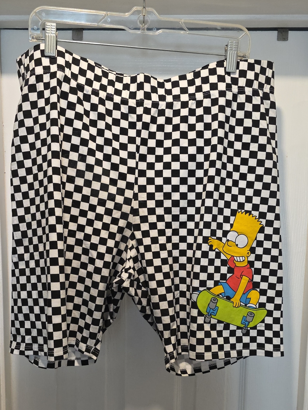 Black & White Checkered Shorts with Bart Simpson Skate Graphic